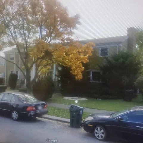 a car parked in front of a house