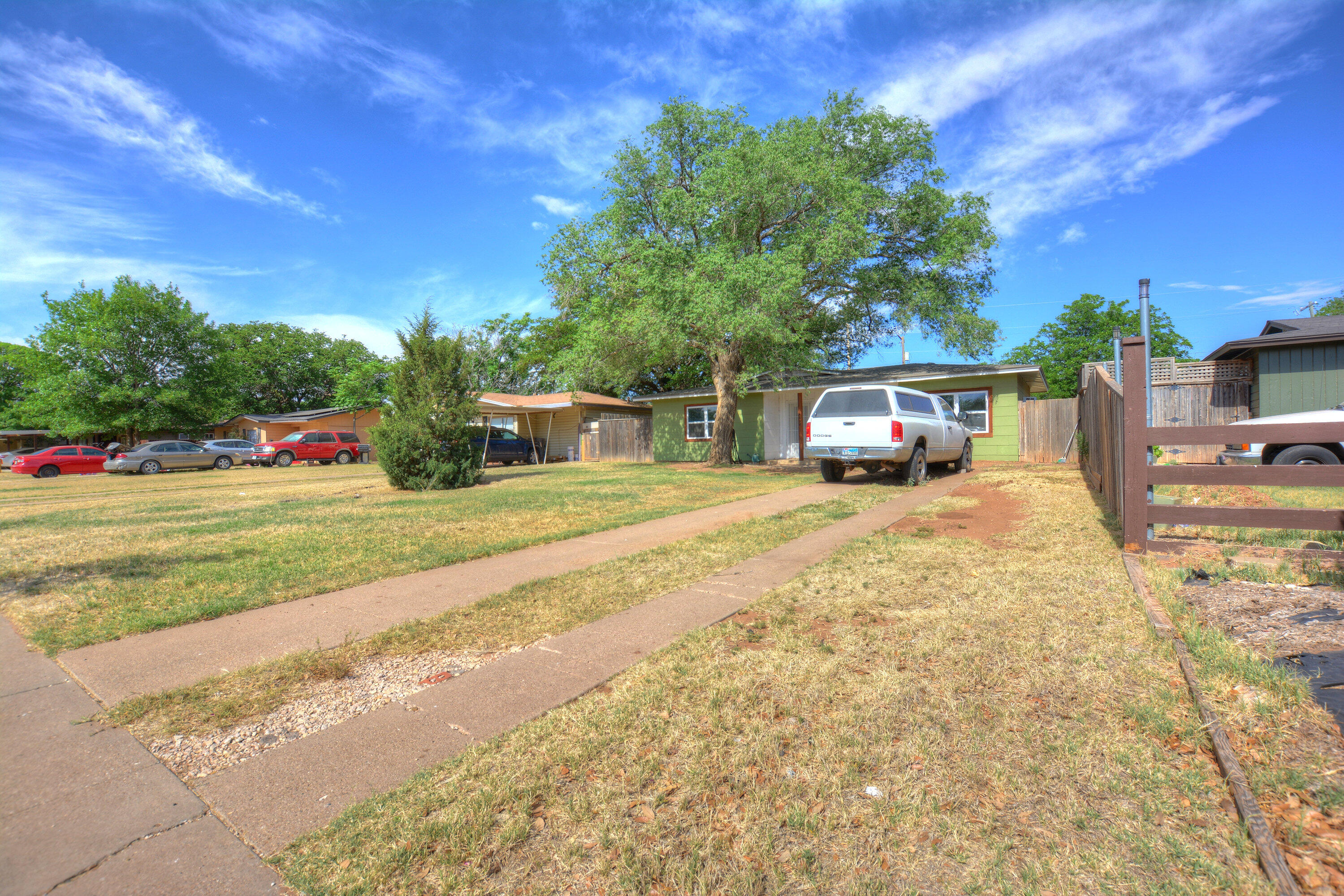 4608 Detroit Avenue Lubbock, TX 79413 - Photo 2 of 20 a view of a house with a yard