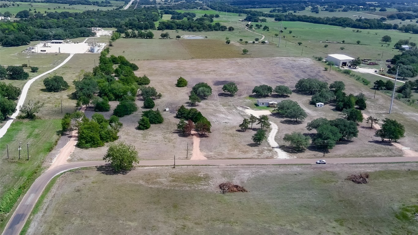 989 East Old Hallettsville Road Flatonia, TX 78941 - Photo 14 of 19 an aerial view of a house with a yard