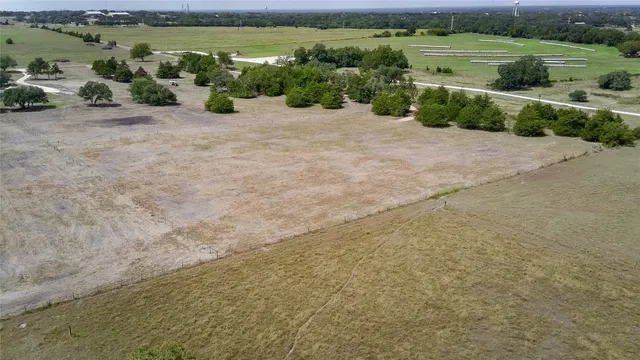 a view of a street with an ocean view