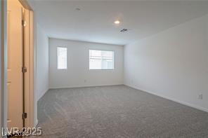 12347 Indigo Montage Road, Unit 3 Las Vegas, NV 89183 - Photo 10 of 23 An airy secondary room provides versatile space, ready for personalization.