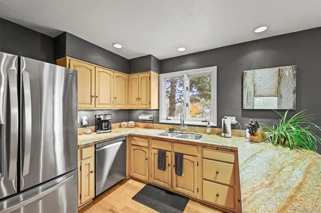 a spacious bedroom with a bed and a couch