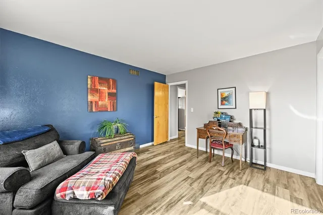 a bathroom with sink a mirror a vanity and shower