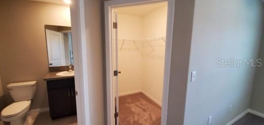 11859 Dumaine Valley Road Riverview, FL 33579 - Photo 11 of 19 a bathroom with a toilet