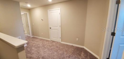 11859 Dumaine Valley Road Riverview, FL 33579 - Photo 16 of 19 an empty room with windows