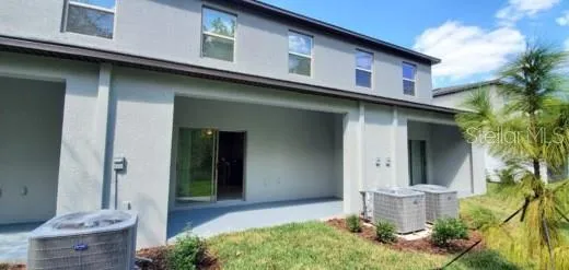 a front view of a house with yard