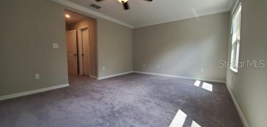 11859 Dumaine Valley Road Riverview, FL 33579 - Photo 7 of 19 an empty room with fan and entrance