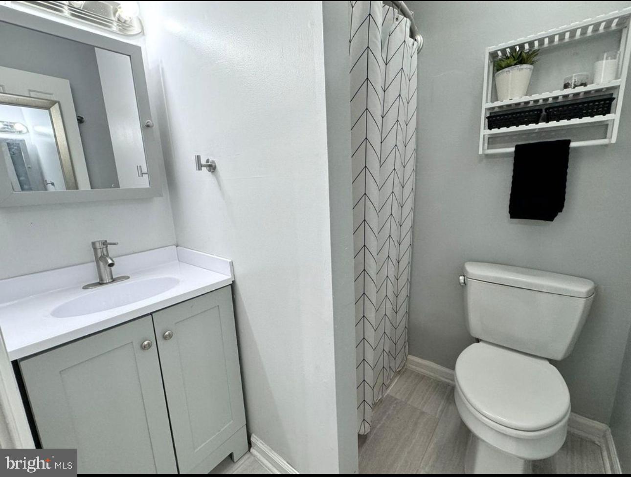 608 Tacketts Mill Road Stafford, VA 22556 - Photo 17 of 20 a bathroom with a toilet sink and mirror