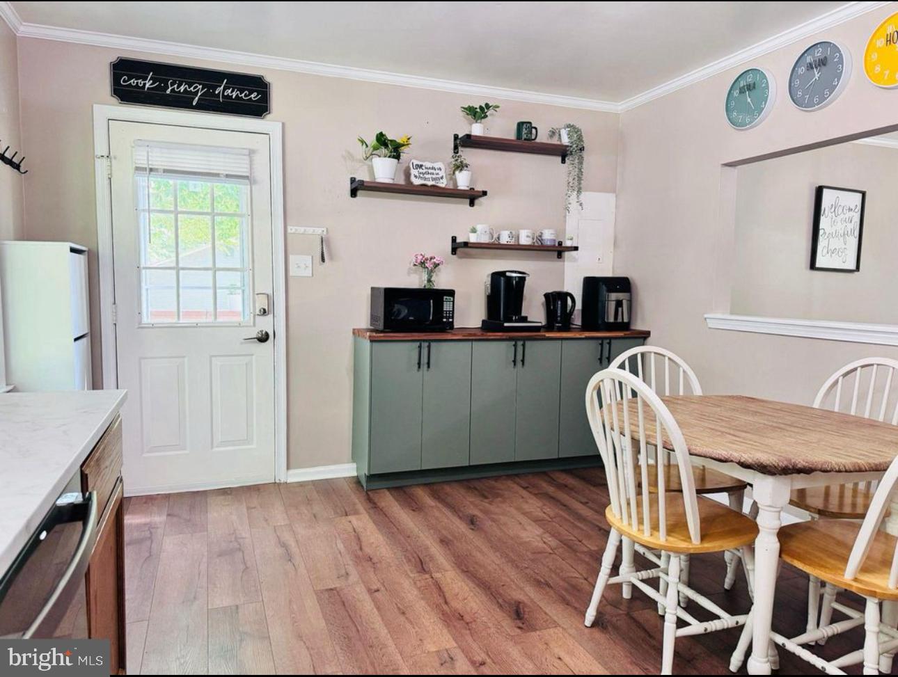 608 Tacketts Mill Road Stafford, VA 22556 - Photo 5 of 20 a view of a dining room with furniture and wooden floor