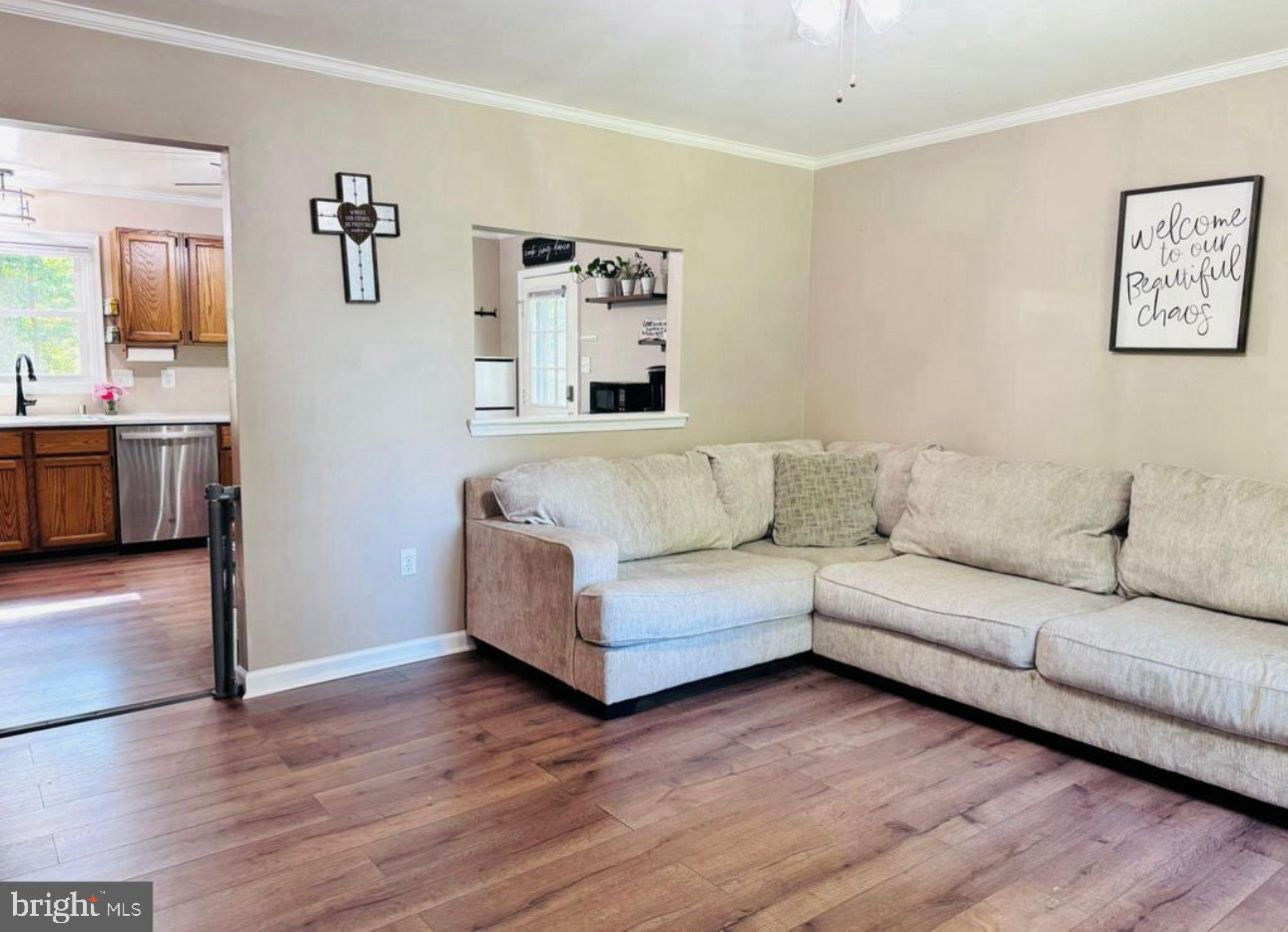 608 Tacketts Mill Road Stafford, VA 22556 - Photo 7 of 20 a living room with furniture and wooden floor