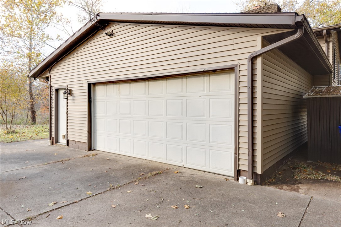 9416 Kieffer Road Mantua, OH 44255 - Photo 4 of 29 Garage featuring driveway