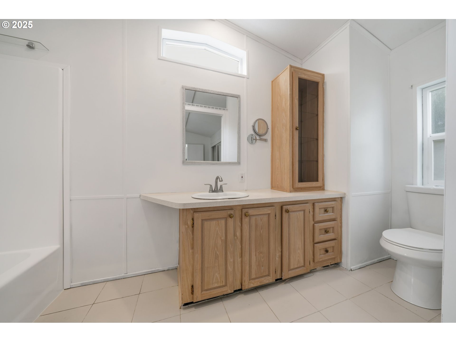 35440 Highway 211, Unit 12 Boring, OR 97009 - Photo 17 of 27 a bathroom with a sink and a mirror