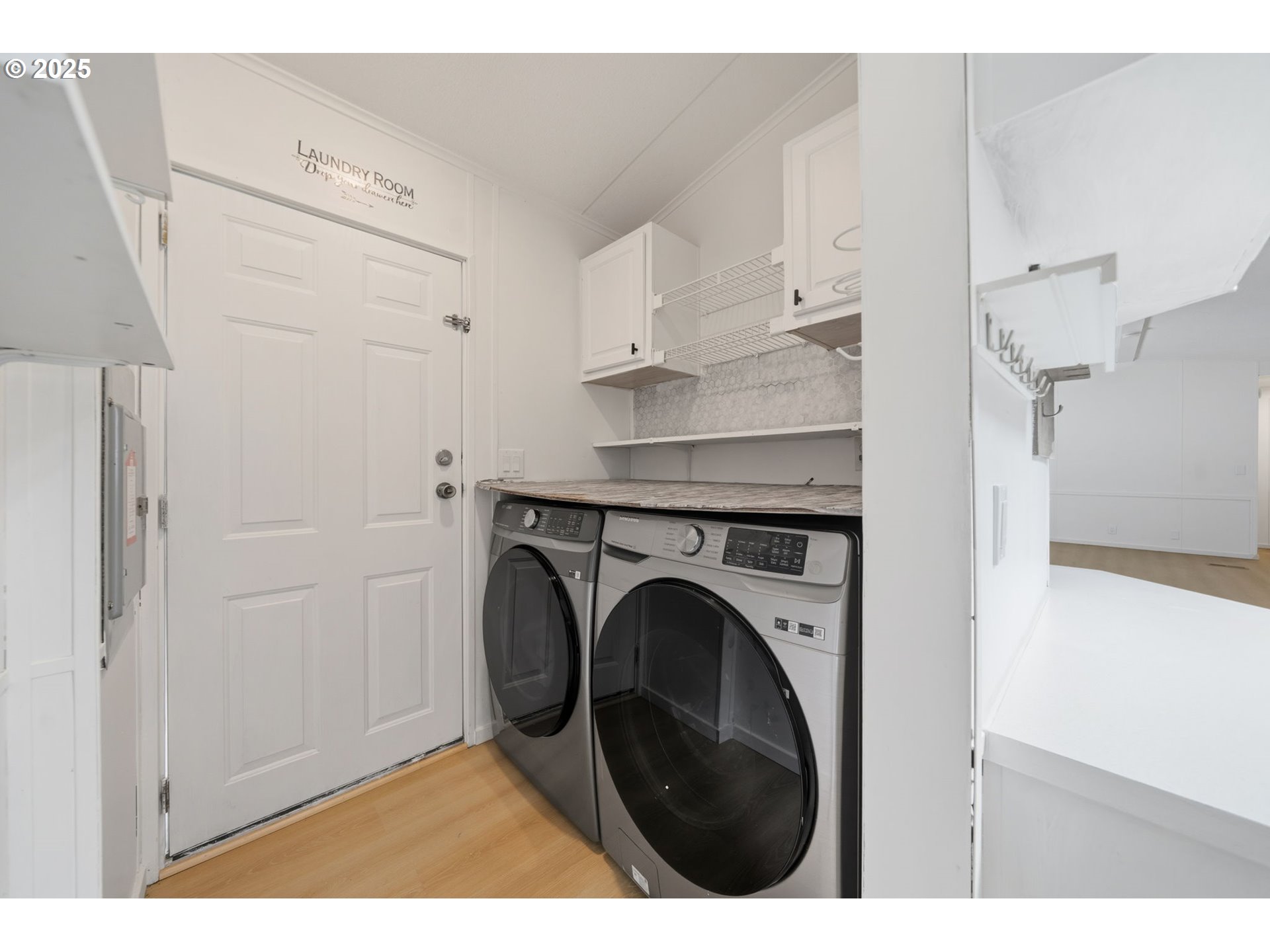 35440 Highway 211, Unit 12 Boring, OR 97009 - Photo 21 of 27 a view of livingroom with washer and dryer