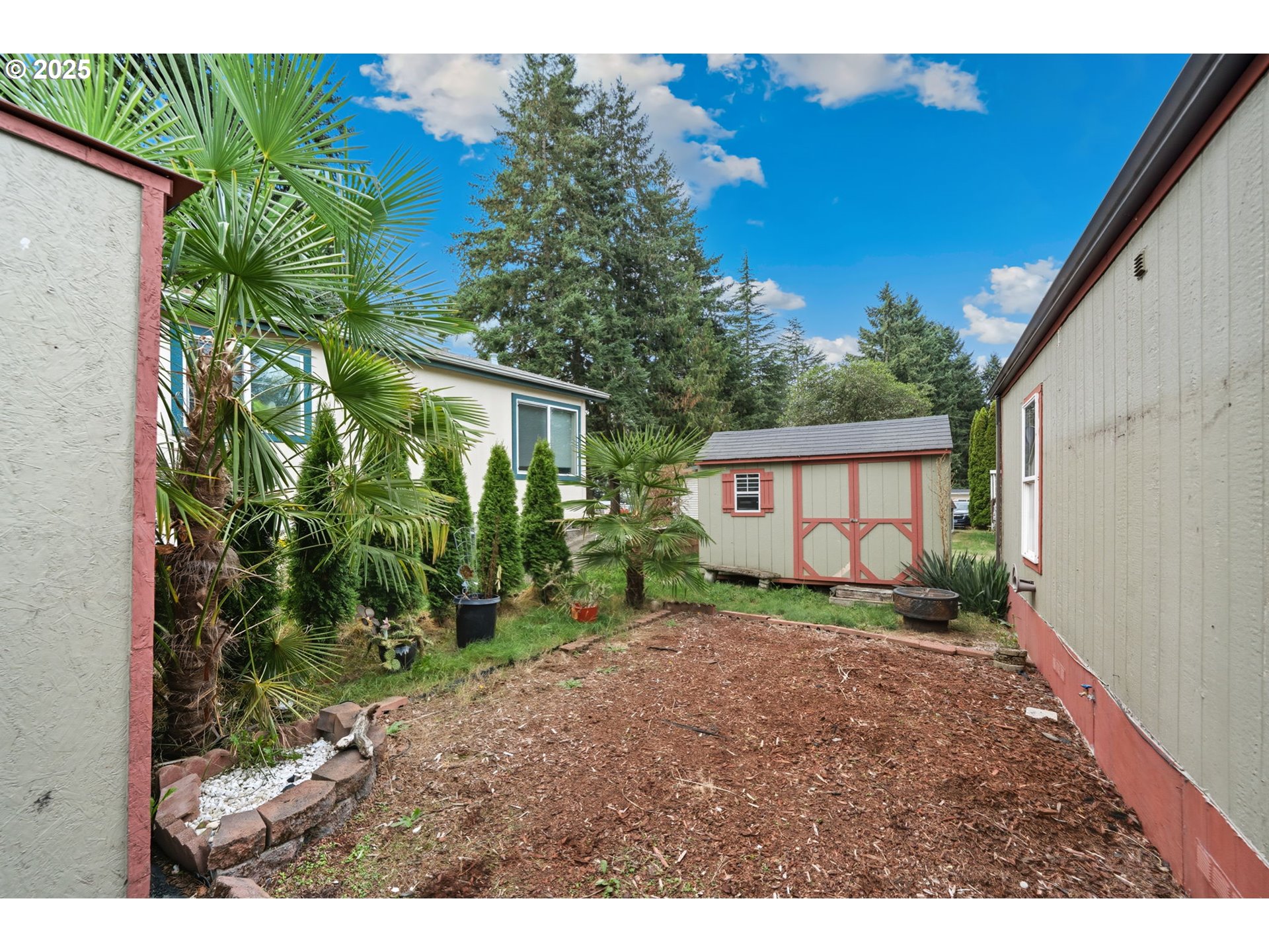 35440 Highway 211, Unit 12 Boring, OR 97009 - Photo 22 of 27 a view of a house with a yard