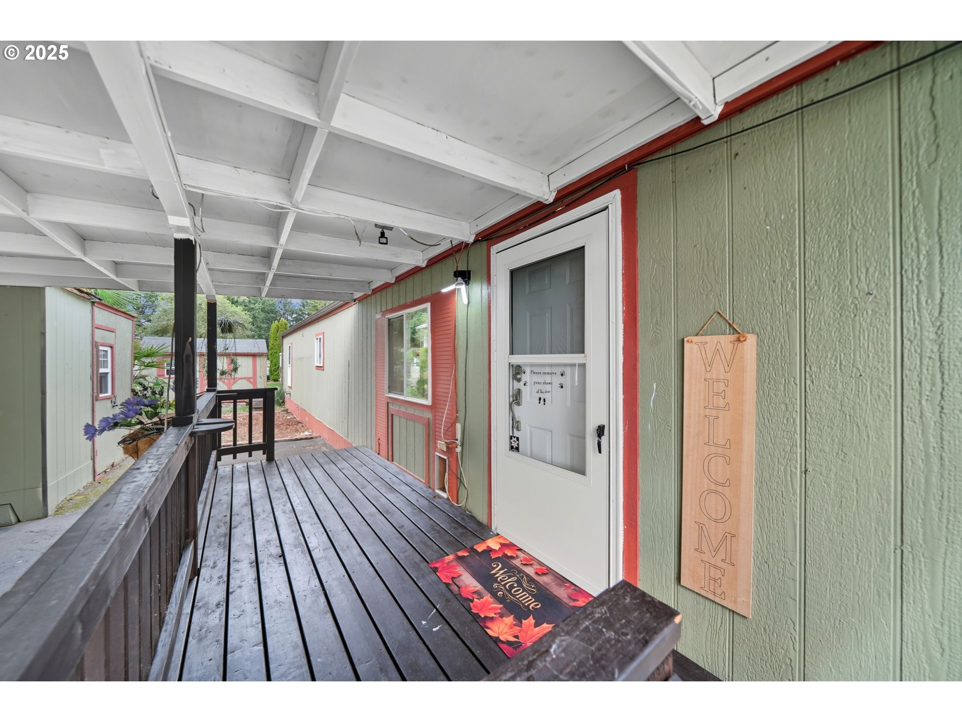 35440 Highway 211, Unit 12 Boring, OR 97009 - Photo 27 of 27 a view of outdoor space with wooden floor and windows