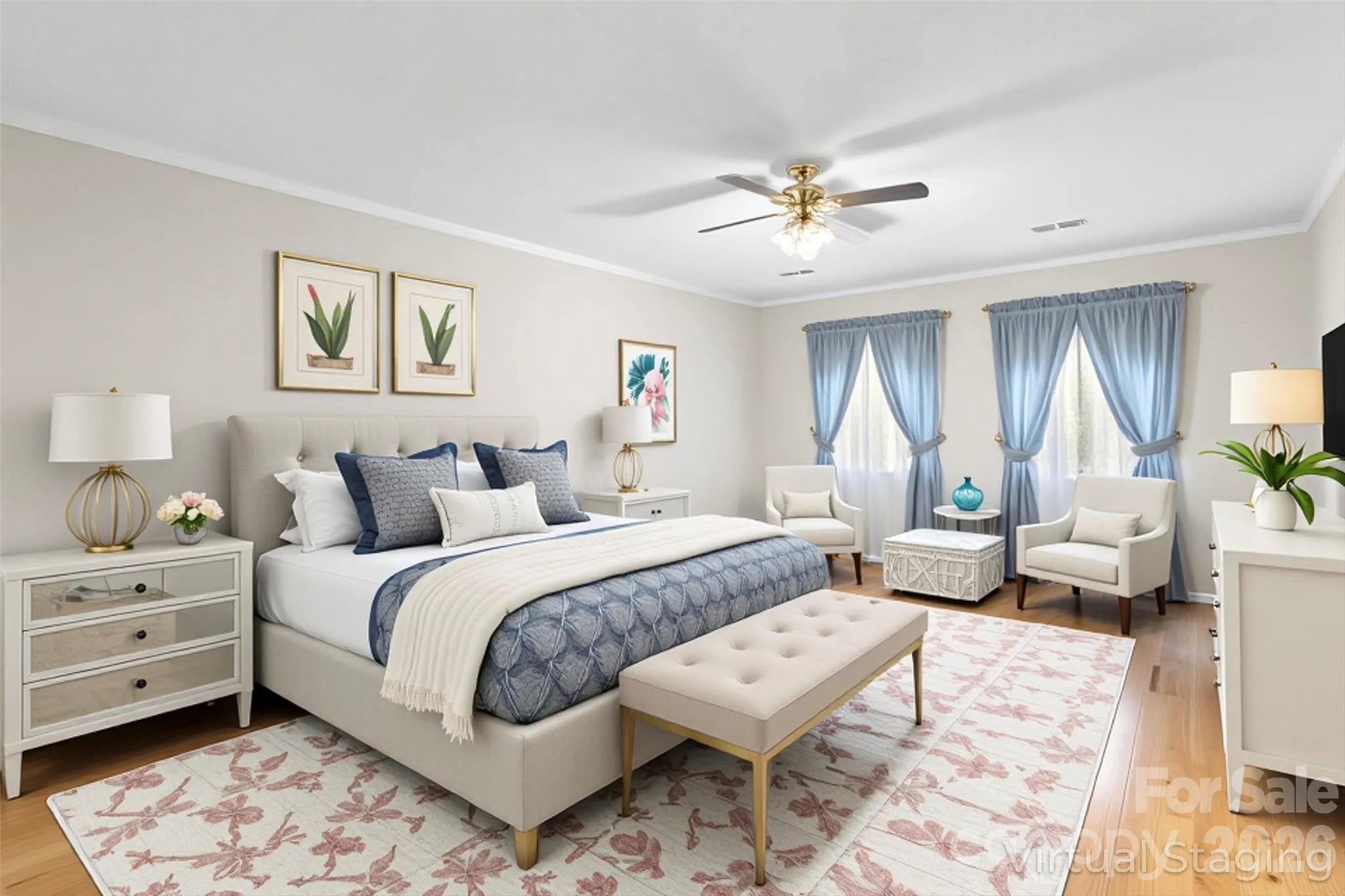 512 Paxton Creek Road Marion, NC 28752 - Photo 15 of 34 a spacious bedroom with a bed and a chandelier