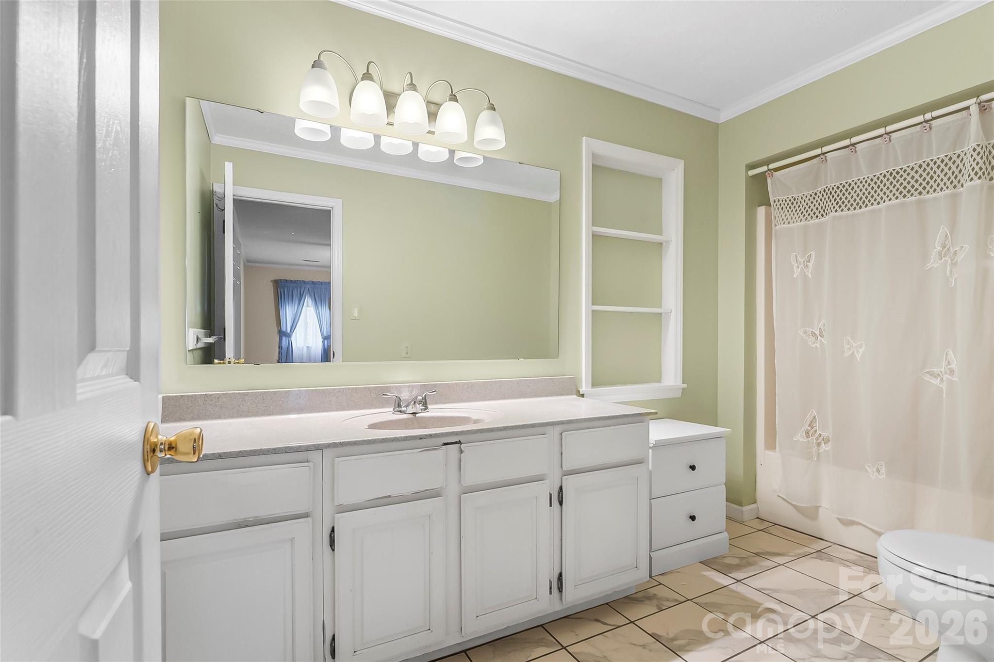 512 Paxton Creek Road Marion, NC 28752 - Photo 17 of 34 a bathroom with a double vanity sink mirror and