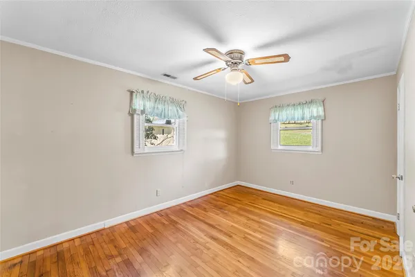 a view of a big room with wooden floor