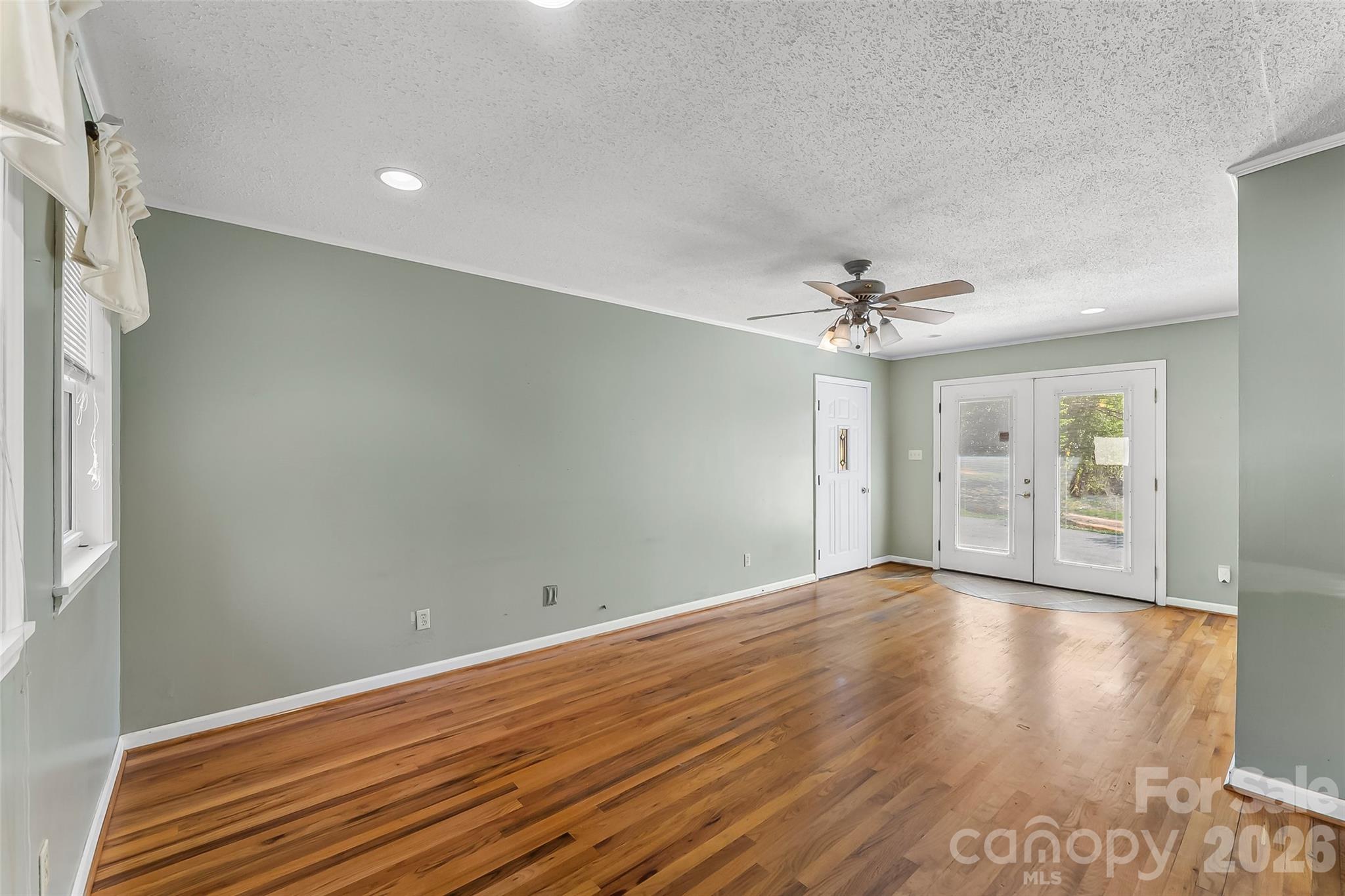 512 Paxton Creek Road Marion, NC 28752 - Photo 26 of 34 wooden floor in an empty room with a window
