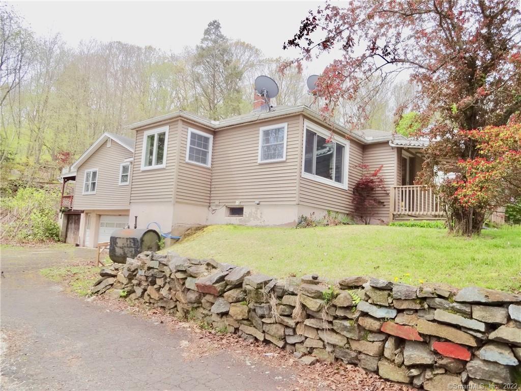 48 Mountain Street Derby, CT 06418 - Photo 1 of 1 a front view of a house with a yard