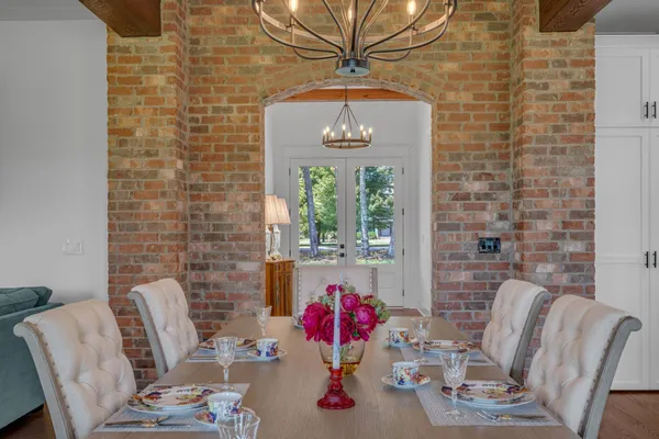 a living room with fireplace furniture and a flat screen tv