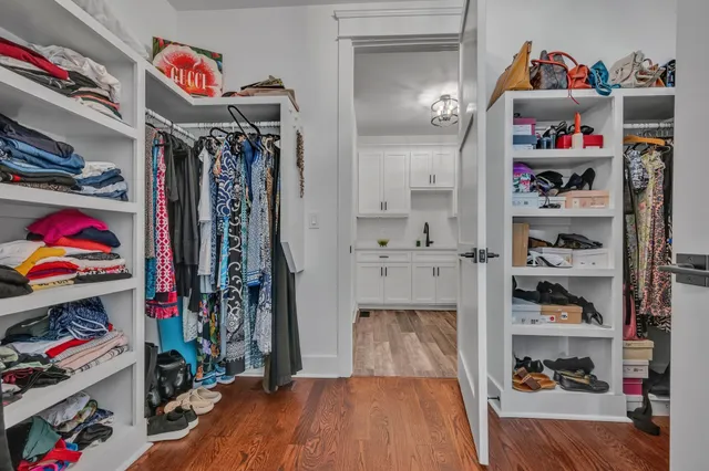 a view of a field of grass and trees