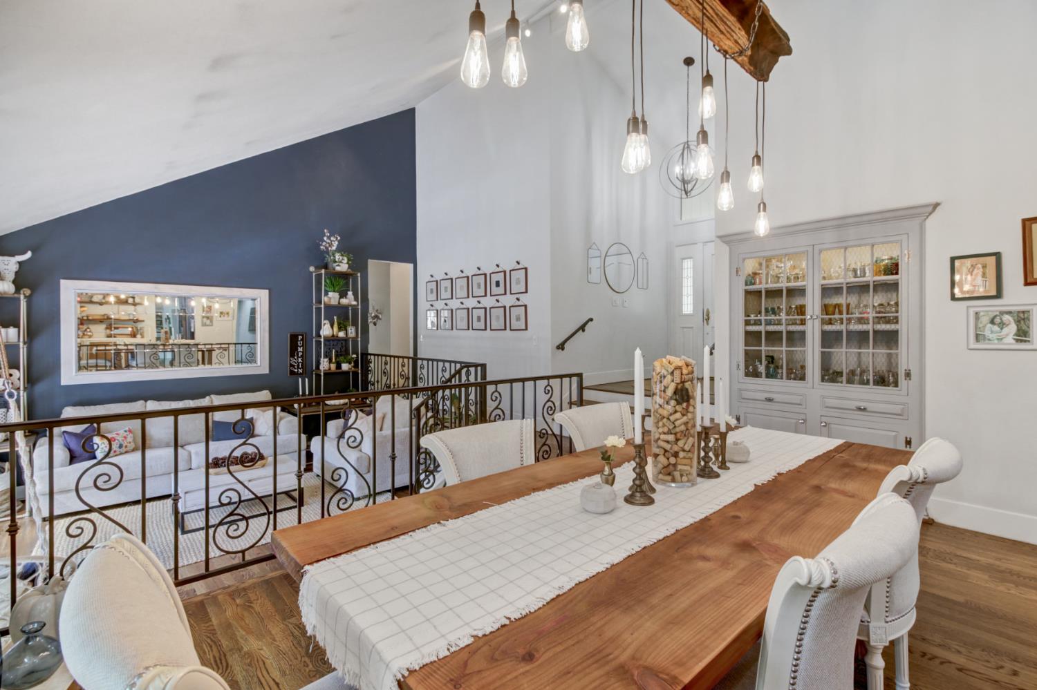 2239 Seabler Place Carmichael, CA 95608 - Photo 15 of 68 a view of a dining room with furniture a chandelier and wooden floor