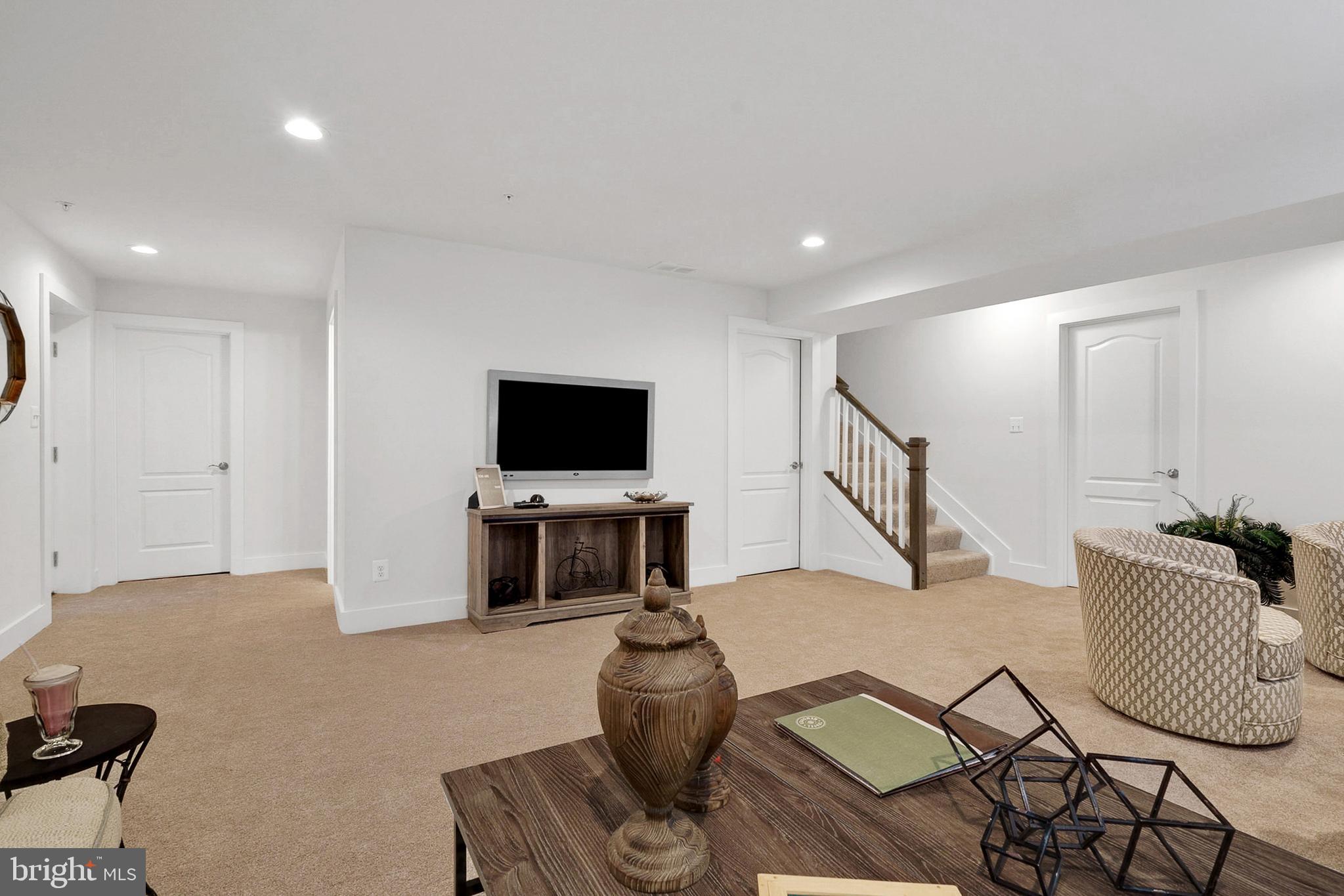 Lot#1 Midhill Road Spring Grove, PA 17362 - Photo 29 of 37 a living room with furniture and a flat screen tv