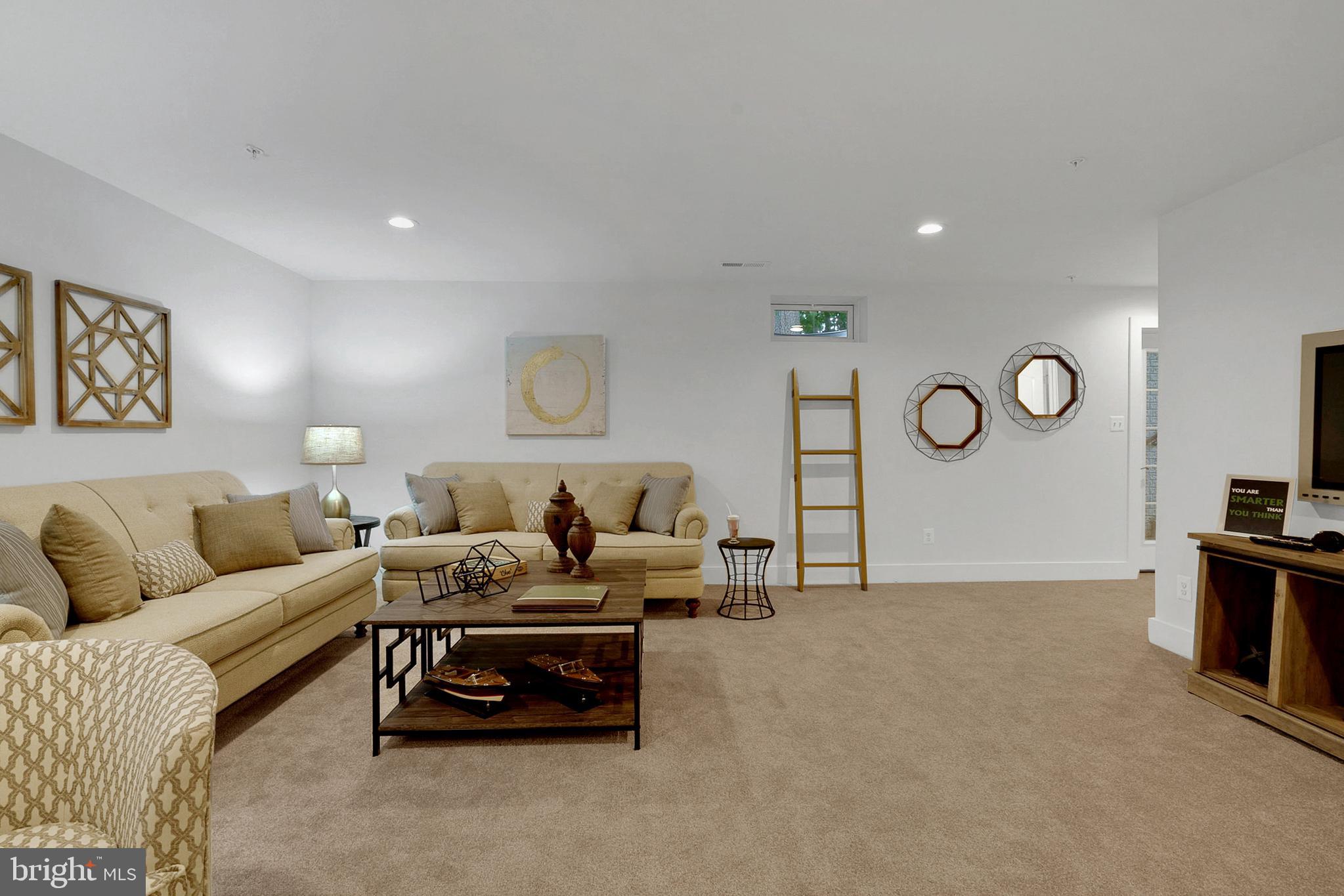 Lot#1 Midhill Road Spring Grove, PA 17362 - Photo 30 of 37 a living room with furniture a rug and a fireplace