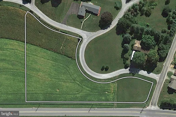 an aerial view of a highlighted house