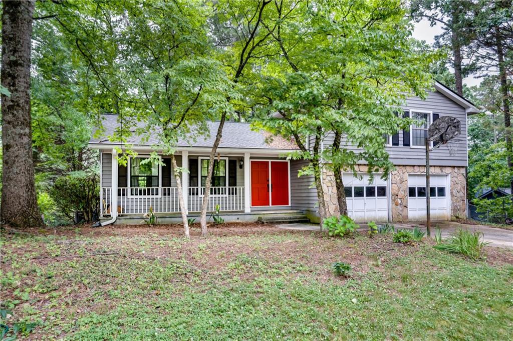 360 Farm Path Roswell, GA 30075 - Photo 1 of 1 front view of a house with a yard