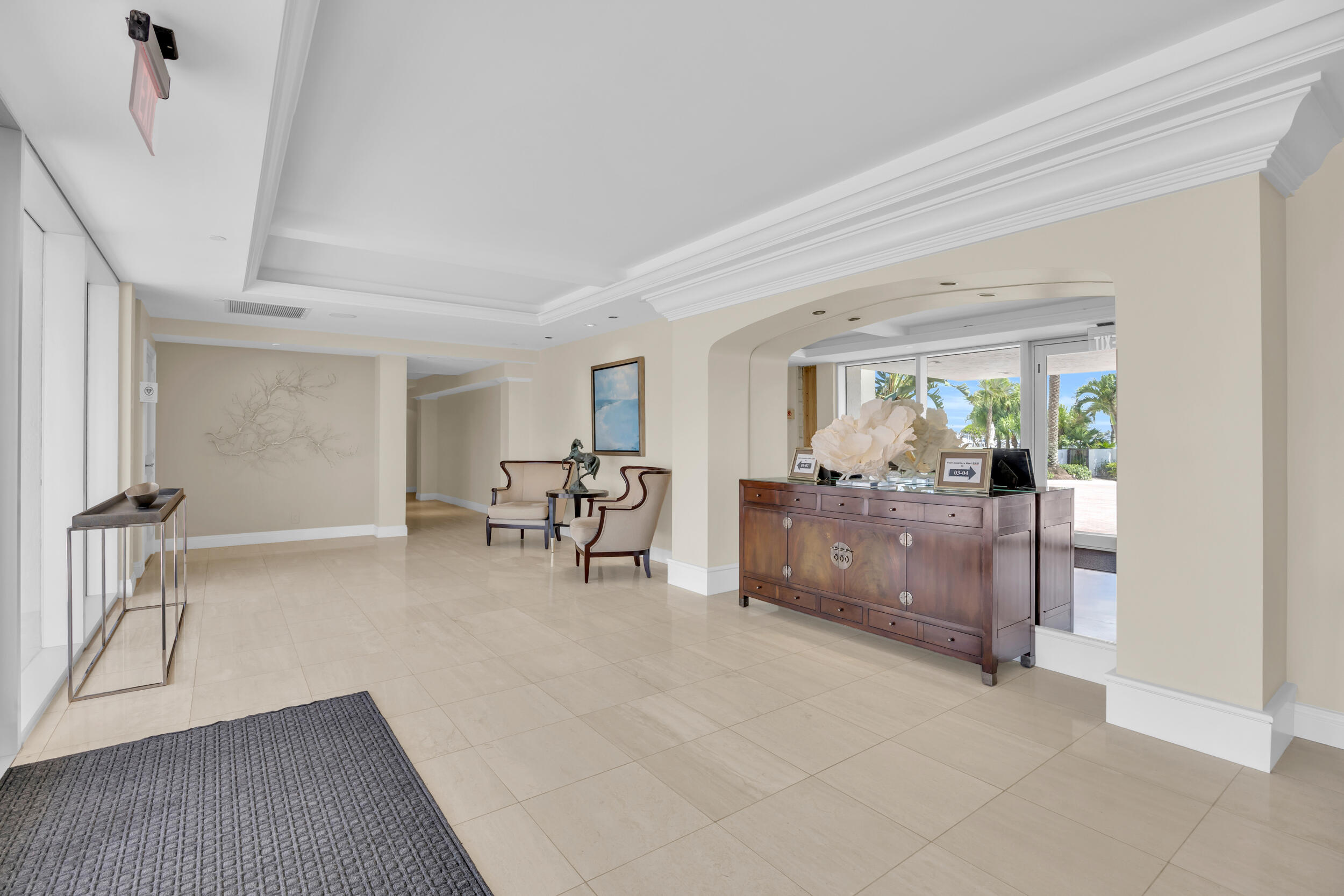 19900 South Beach Road, Unit 503 Jupiter, FL 33469 - Photo 14 of 51 a living room with furniture and a dining table