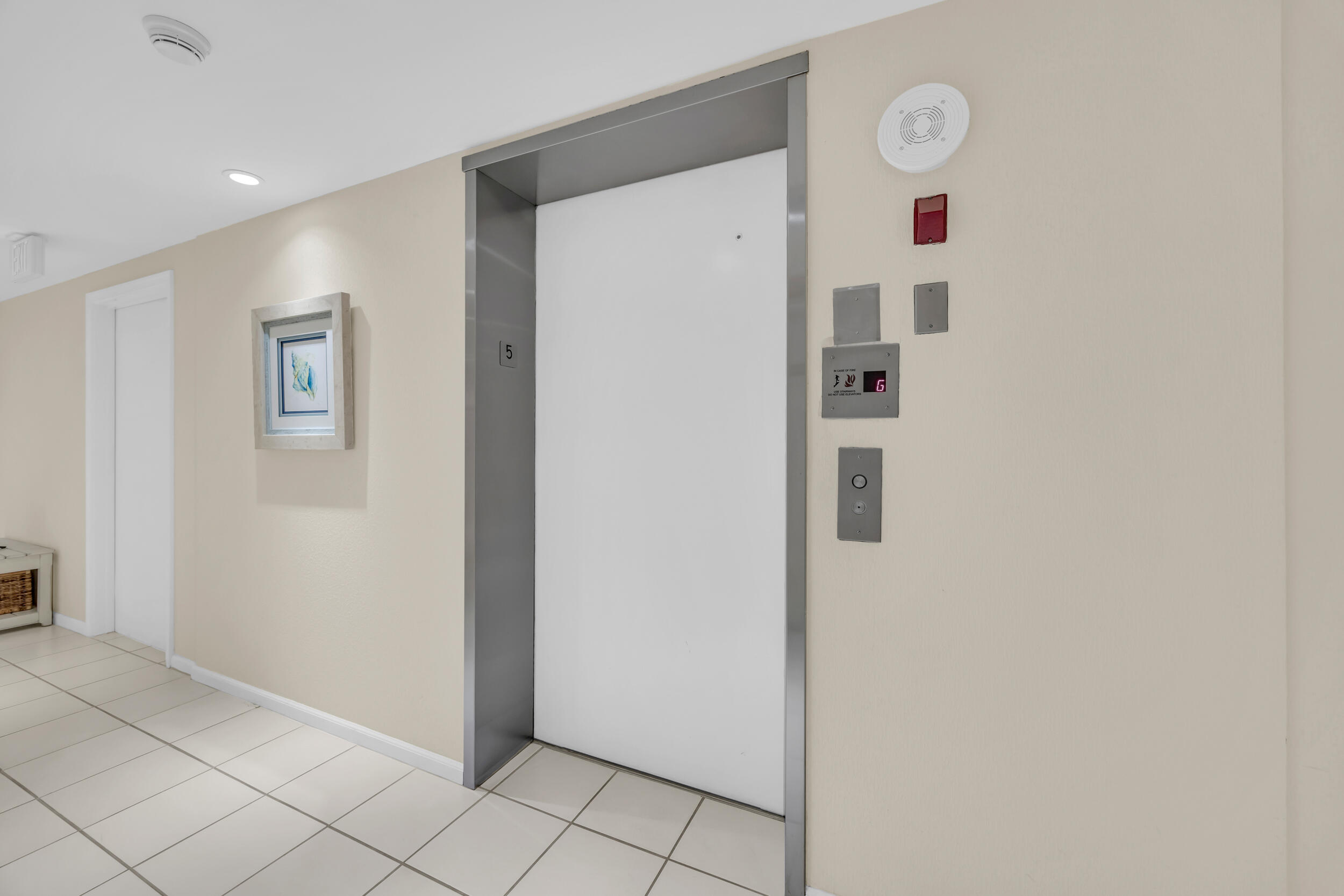 19900 South Beach Road, Unit 503 Jupiter, FL 33469 - Photo 15 of 51 a view of a hallway with entryway door