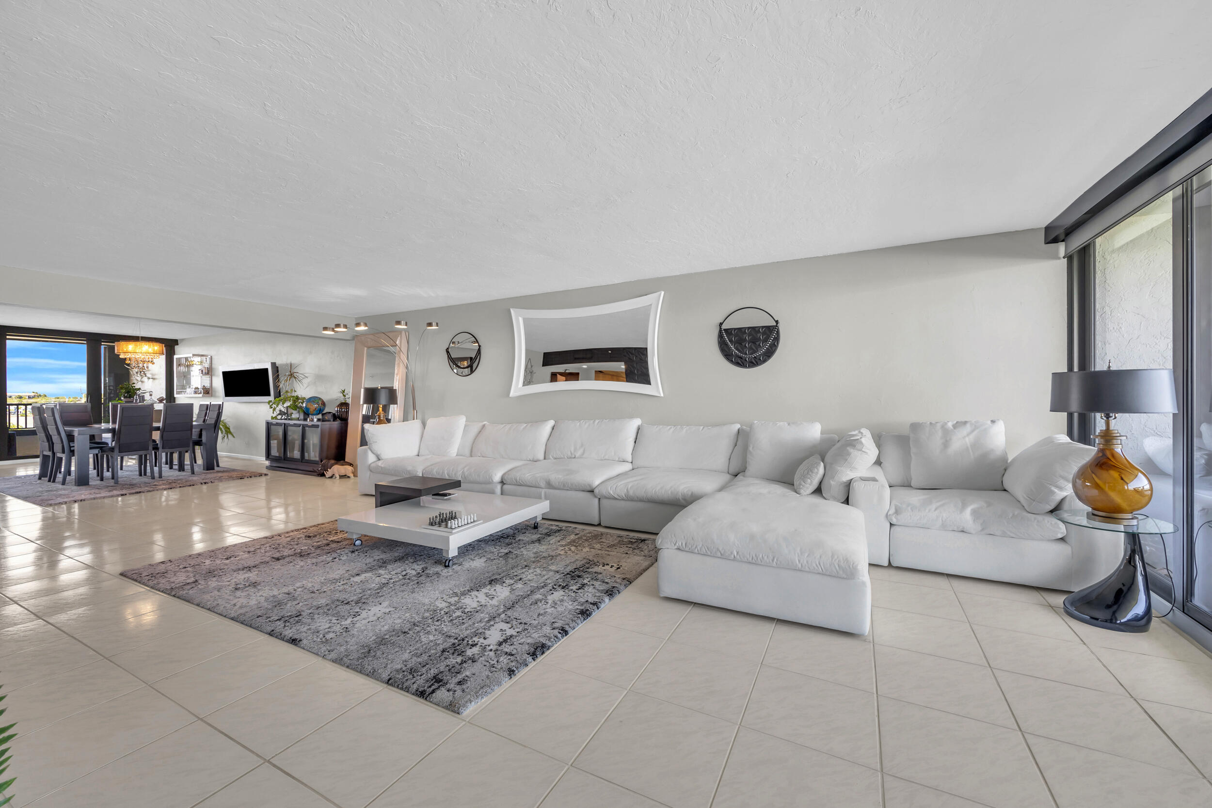 19900 South Beach Road, Unit 503 Jupiter, FL 33469 - Photo 21 of 51 a living room with furniture and a wooden floor