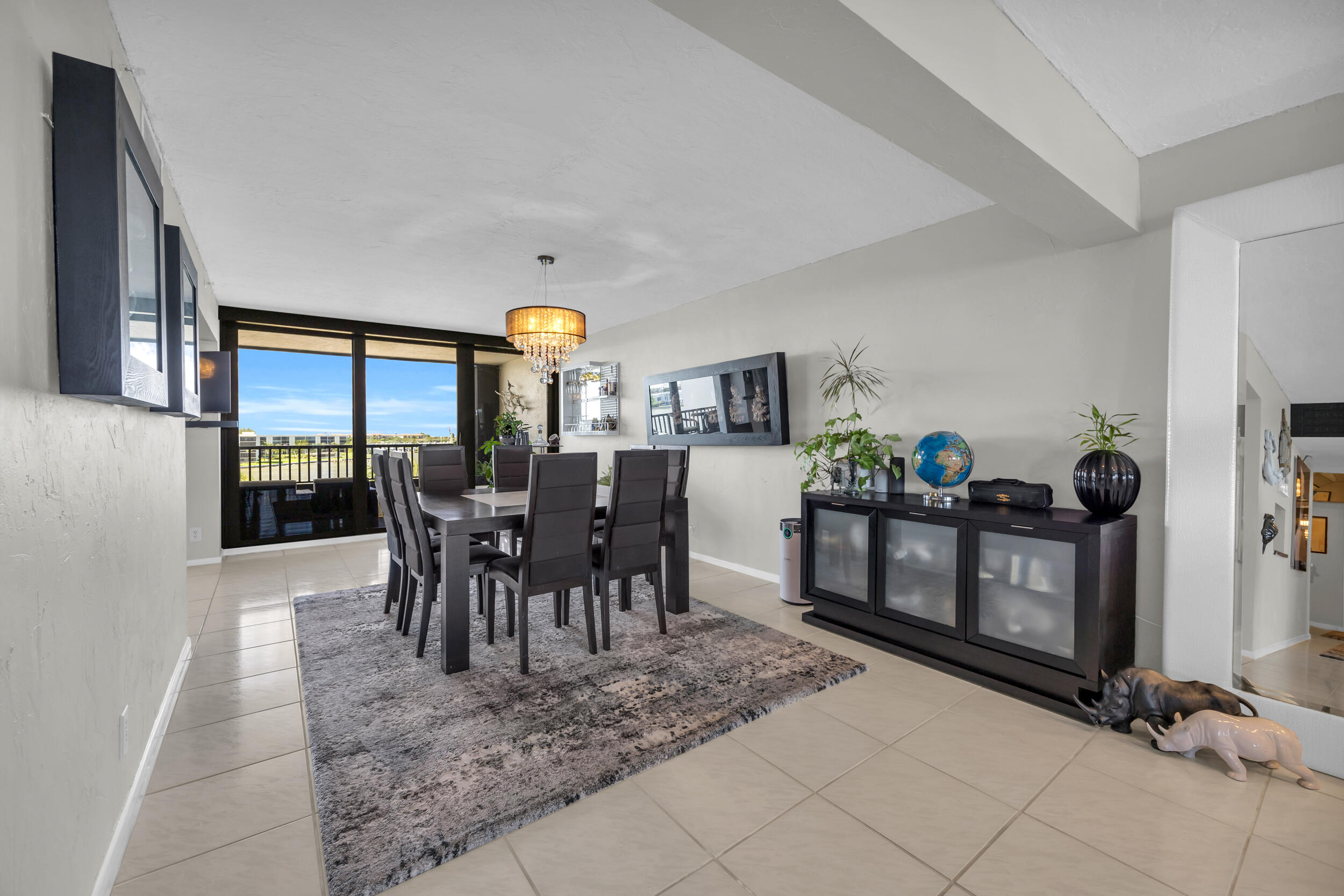 19900 South Beach Road, Unit 503 Jupiter, FL 33469 - Photo 23 of 51 a view of a dining room with furniture