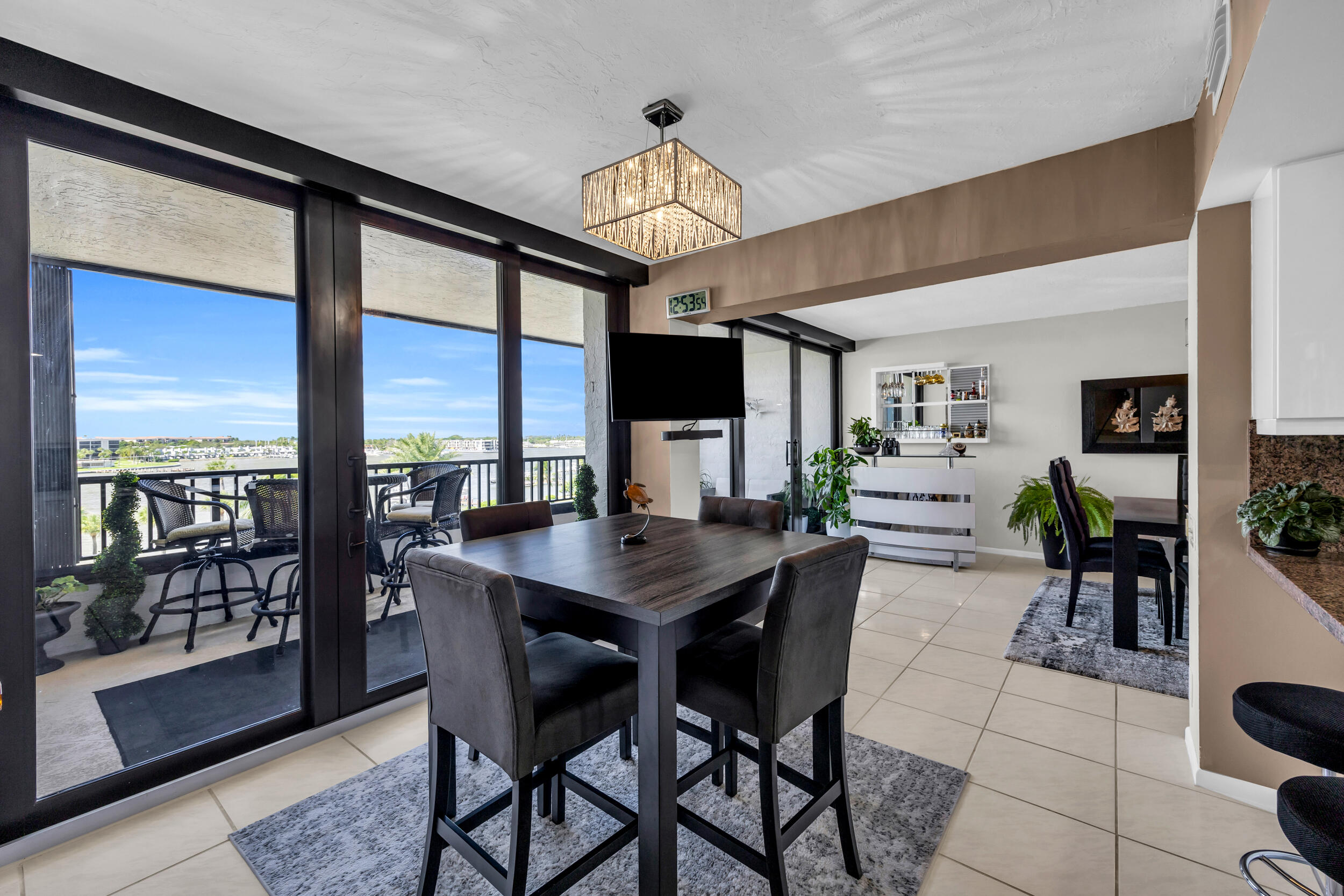 19900 South Beach Road, Unit 503 Jupiter, FL 33469 - Photo 26 of 51 a view of a dining room with furniture window and outside view