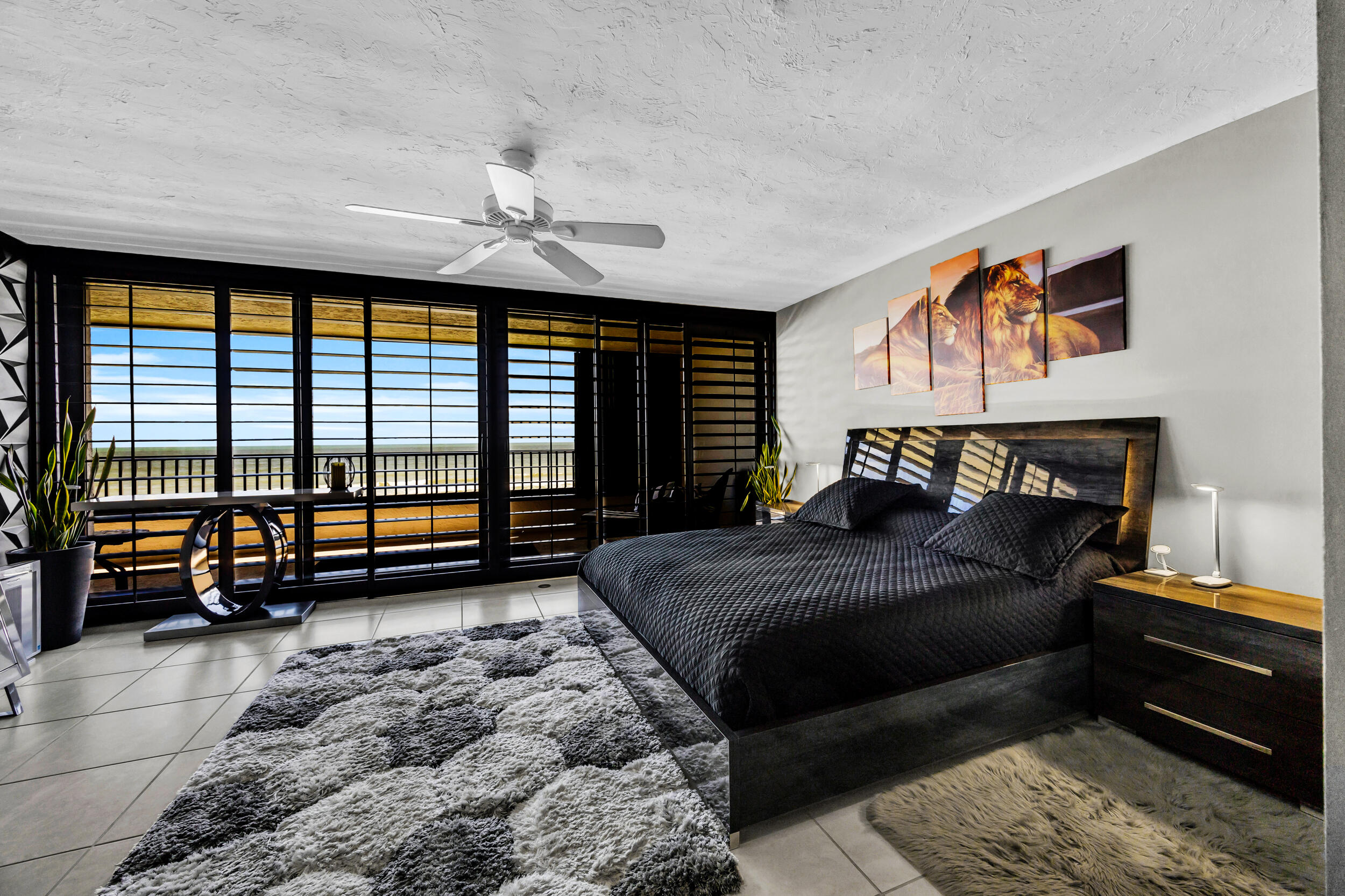 19900 South Beach Road, Unit 503 Jupiter, FL 33469 - Photo 31 of 51 a bedroom with a bed and a couch