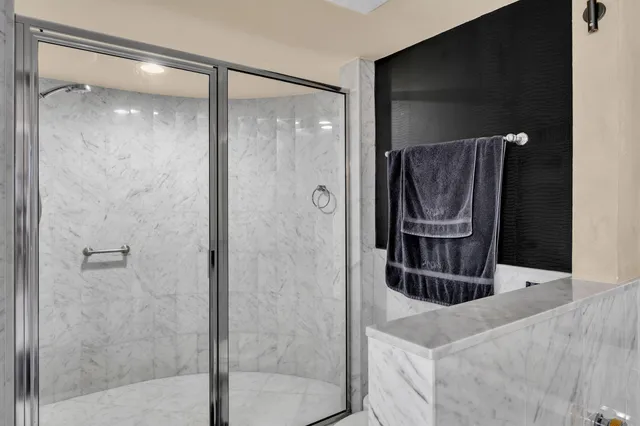 a view of swimming pool with a table and chairs