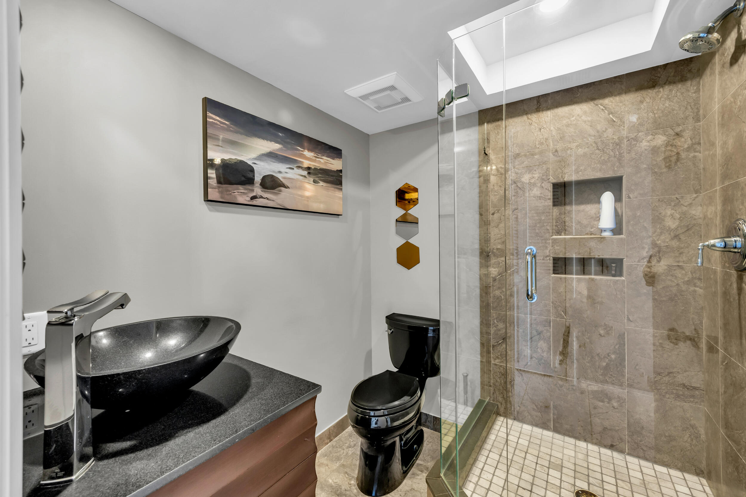 19900 South Beach Road, Unit 503 Jupiter, FL 33469 - Photo 48 of 51 a bathroom with a toilet and a shower