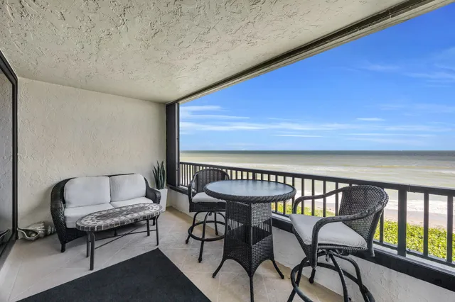 a view of an ocean from a balcony