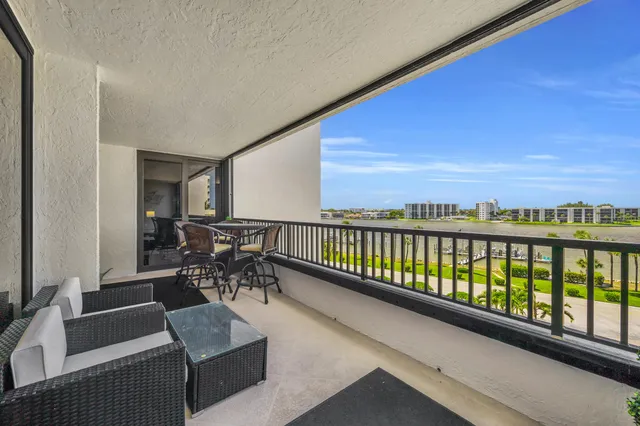 a view of a hallway with entryway door