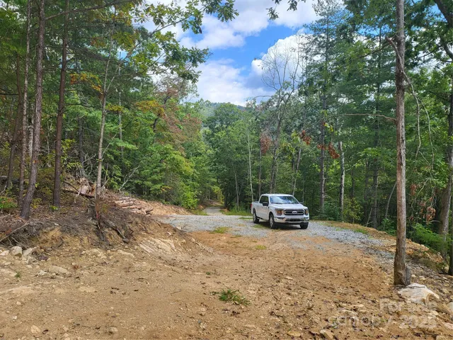 a car parked in front of a road