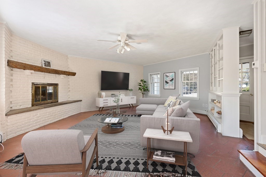 8 Juniper Place Lexington, MA 02420 - Photo 11 of 42 a living room with furniture and a flat screen tv