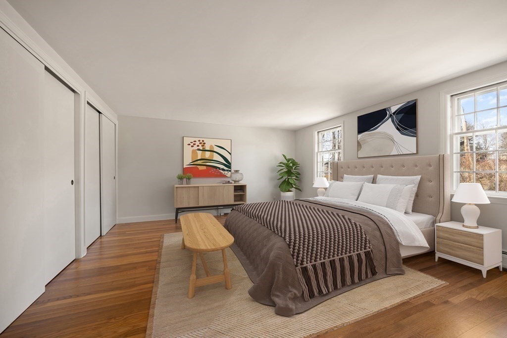 8 Juniper Place Lexington, MA 02420 - Photo 19 of 42 a bedroom with a bed and window