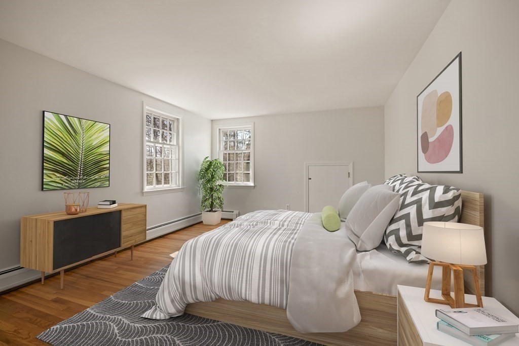 8 Juniper Place Lexington, MA 02420 - Photo 25 of 42 a bedroom with a bed and window