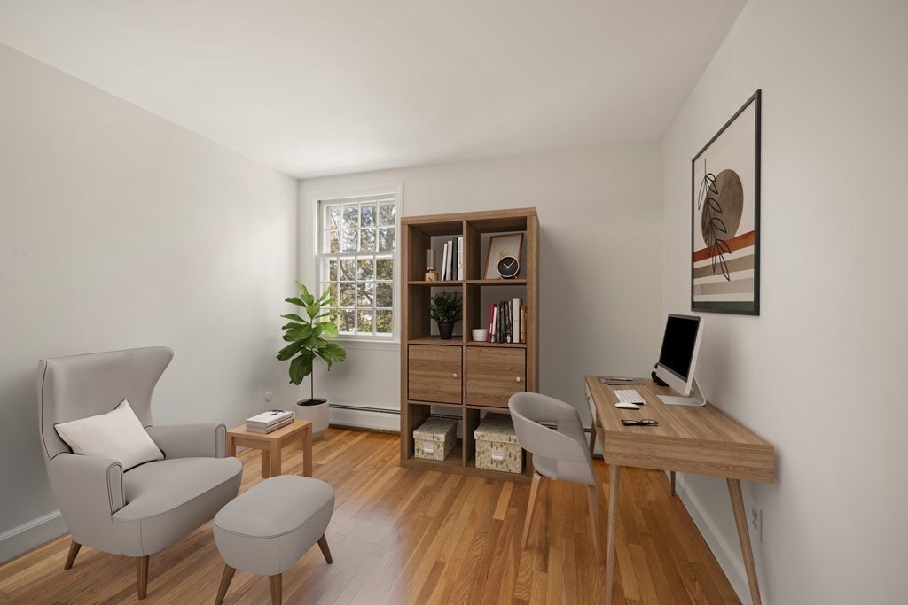 8 Juniper Place Lexington, MA 02420 - Photo 27 of 42 a workspace with furniture and wooden floor