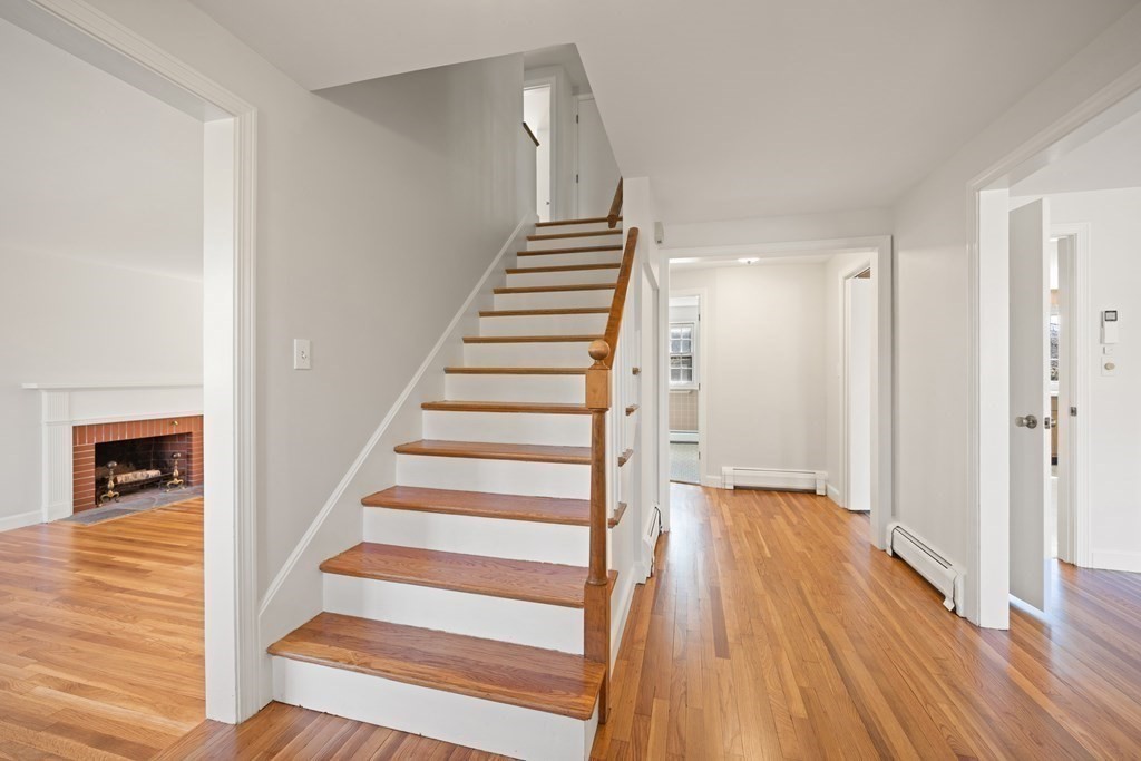 8 Juniper Place Lexington, MA 02420 - Photo 3 of 42 a view of entryway with wooden floor