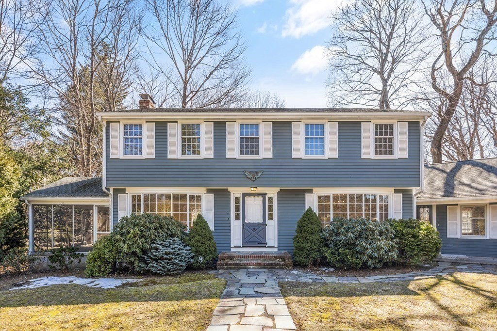 8 Juniper Place Lexington, MA 02420 - Photo 39 of 42 a front view of a house with yard and green space
