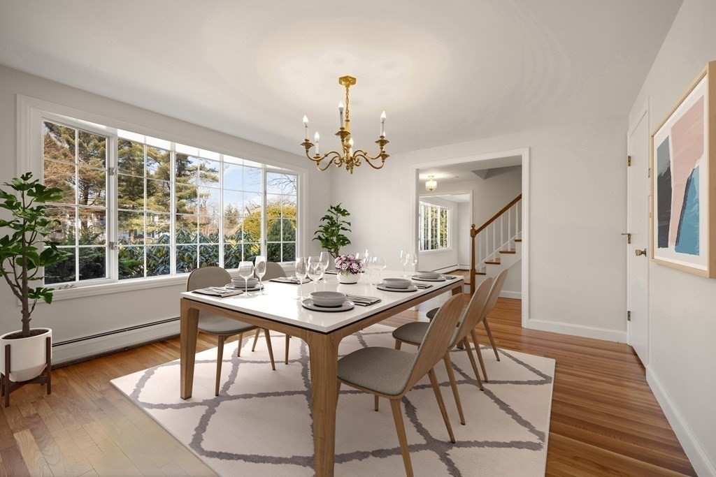 8 Juniper Place Lexington, MA 02420 - Photo 8 of 42 a view of a dining room with furniture window and wooden floor