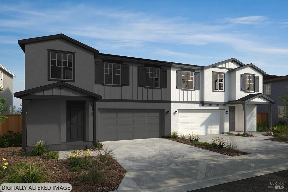 3859 Terrabrook Drive Santa Rosa, CA 95407 - Photo 1 of 4 a front view of a house with a yard and garage